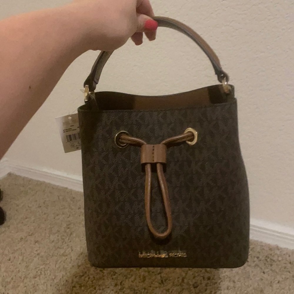 Brown Michael kors bucket crossbody purse. Brand new